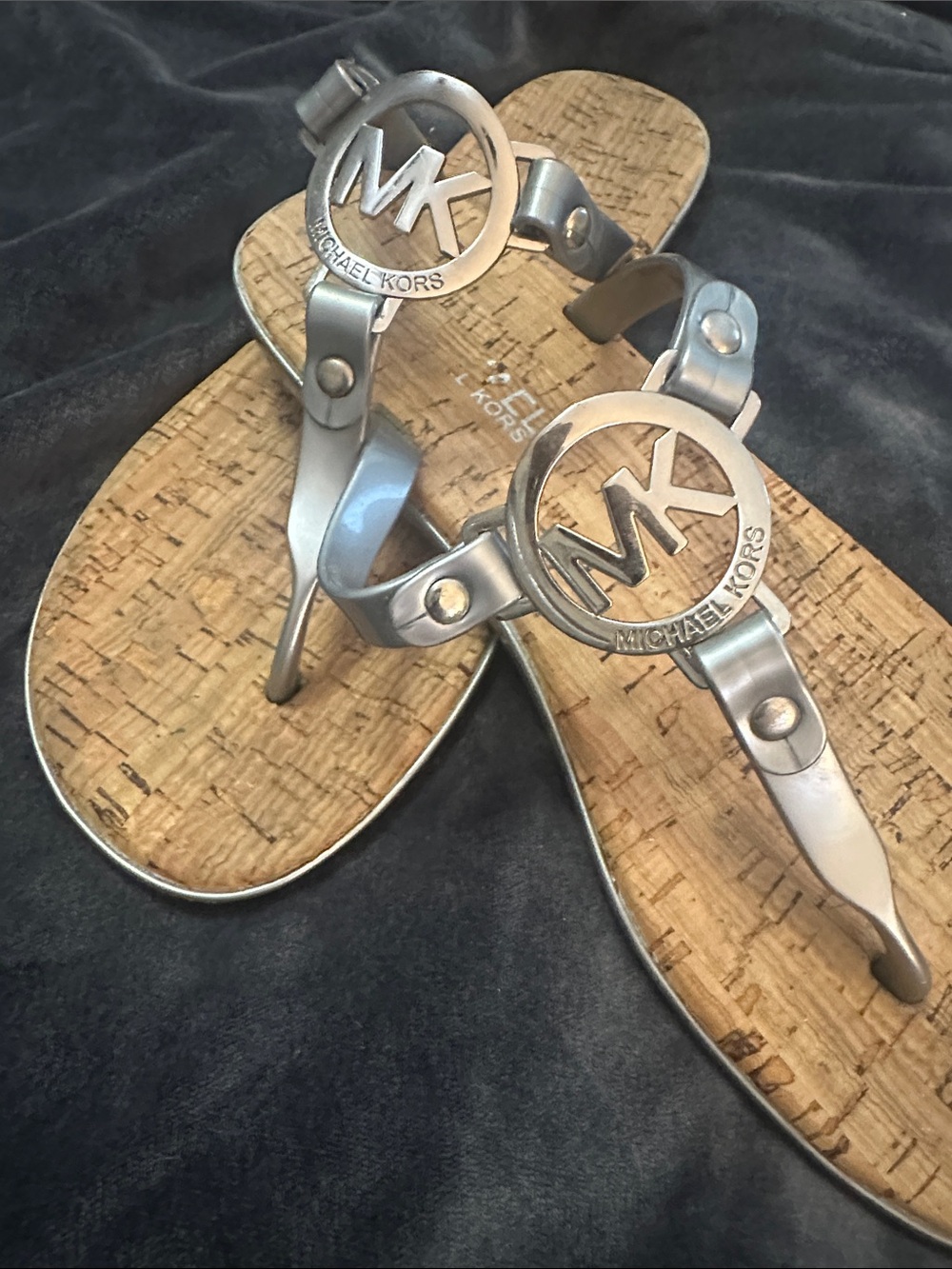 Ladies EUC is a Michael Kors Silver Logo Cork FThong Sandals size 7 flip flop